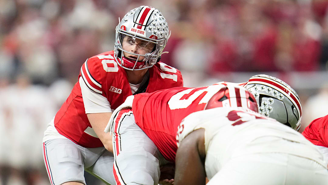 Ohio State Buckeyes quarterback Julian Sayin (10) lines up during the first half of the Big Ten Conference championship game against the Indiana Hoosiers at Lucas Oil Stadium in Indianapolis on Dec. 6, 2025. Ohio State Buckeyes quarterback Julian Sayin (10) lines up during the first half of the Big Ten Conference championship game against the Indiana Hoosiers at Lucas Oil Stadium in Indianapolis on Dec. 6, 2025.