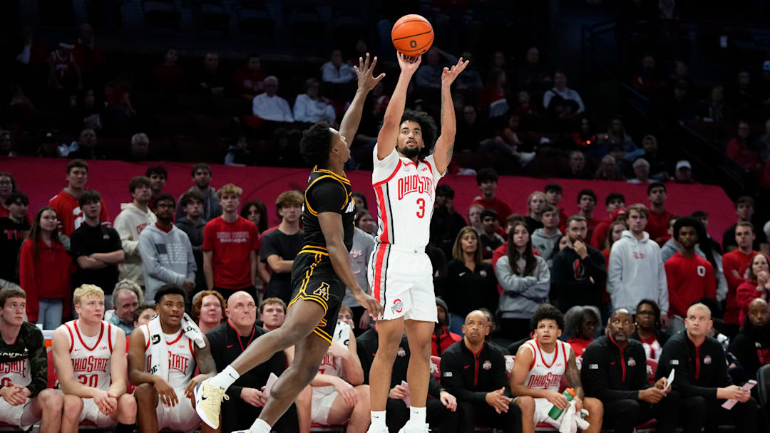 Ohio State Buckeyes guard Taison Chatman (3) shoots a three pointer over Appalachian State Mountaineers guard Eren Banks (4) during the NCAA men's basketball game at Value City Arena in Columbus on Nov. 11, 2025. Ohio State won 75-53.