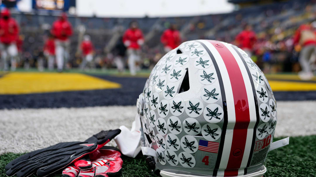 The helmet of Ohio State Buckeyes wide receiver Jeremiah Smith sits on the sideline prior to the NCAA football game against the Michigan Wolverines at Michigan Stadium in Ann Arbor, Mich. Nov. 29, 2025.