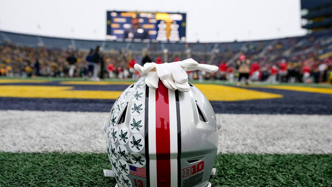 An Ohio State Buckeyes helmet sits behind the endzone as the team warms up for its game against the Michigan Wolverines during the NCAA football game at Michigan Stadium in Ann Arbor, Mich. on Nov. 29, 2025. Ohio State won 27-9.