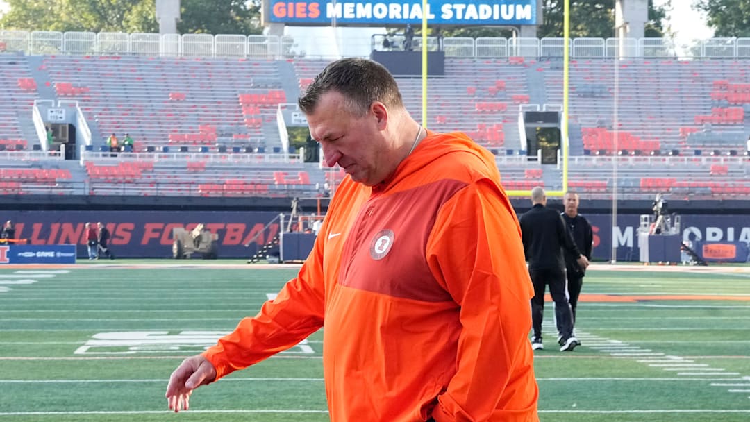 Illinois Fighting Illini head coach Bret Bielema walks across the field as the team arrives prior to the NCAA football game against the Ohio State Buckeyes at Gies Memorial Stadium in Champaign on Oct. 11, 2025.