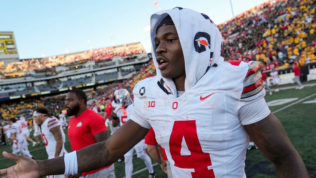 Ohio State Buckeyes wide receiver Jeremiah Smith (4) leaves the field following the 31-14 win over the Iowa Hawkeyes in the NCAA football game at Kinnick Stadium in Iowa City on Oct. 3, 2026.