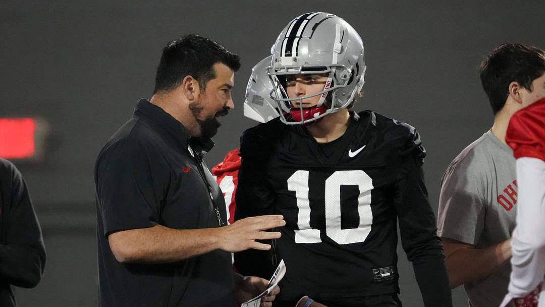 Mar 7, 2024; Columbus, OH, USA; Ohio State Buckeyes head coach Ryan Day talks to quarterback Julian Sayin (10) during spring football practice at the Woody Hayes Athletic Center.