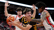 Ohio State Buckeyes forward Devin Royal (21) defends Valparaiso Beacons forward Cooper Schwieger (13) during the during the first half of the NCAA men's basketball game at Value City Arena in Columbus on Dec. 17, 2024.