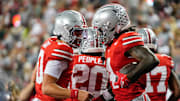Ohio State Buckeyes quarterback Julian Sayin (10) celebrates a touchdown by wide receiver Jeremiah Smith (4) during the second half of the NCAA football game against the Ohio Bobcats at Ohio Stadium on Sept. 13, 2025. Ohio State won 37-9.