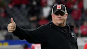 Ohio State Buckeyes offensive coordinator Chip Kelly leads warm ups prior to the Cotton Bowl Classic College Football Playoff semifinal game against the Texas Longhorns at AT&T Stadium in Arlington, Texas on Jan. 10, 2025.