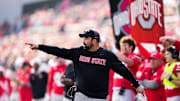 Ohio State Buckeyes head coach Ryan Day motions from the sideline during the first half of the NCAA football game against the Rutgers Scarlet Knights at Ohio Stadium in Columbus on Nov. 22, 2025.