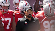 Ohio State Buckeyes head coach Ryan Day leads his team onto the field prior to the NCAA football game against the Texas Longhorns at Ohio Stadium on Aug. 30, 2025.
