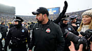 Ohio State Buckeyes head coach Ryan Day leaves the field following the NCAA football game against the Michigan Wolverines at Michigan Stadium in Ann Arbor, Mich. on Nov. 29, 2025. Ohio State won 27-9.
