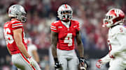 Ohio State Buckeyes wide receiver Jeremiah Smith (4) celebrates a catch during the first half of the Big Ten Conference championship game against the Indiana Hoosiers at Lucas Oil Stadium in Indianapolis on Dec. 6, 2025.