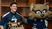 Division II - Class A 2024 Tennessee Titans Mr. Football Jared Curtis, Nashville Christian School, is photographed with T-Rac during the Titans Mr. Football Awards at Nissan Stadium in Nashville, Tenn., Tuesday, Dec. 10, 2024.