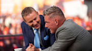 Pat McAfee, right, talks to Kirk Herbstreit on the set of ESPN College GameDay prior to the NCAA football game between the Ohio State Buckeyes and the Texas Longhorns at Ohio Stadium on Aug. 30, 2025.
