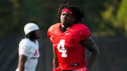 Aug 8, 2024; Columbus, Ohio, USA; Ohio State Buckeyes wide receiver Jeremiah Smith (4) runs during football practice at the Woody Hayes Athletic Complex.