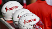 Oct 18, 2025; Houston, Texas, USA; A detail view of Houston Cougars helmets on the sideline during the game against the Arizona Wildcats at TDECU Stadium. Mandatory Credit: Maria Lysaker-Imagn Images 