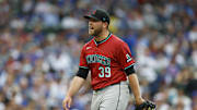 Apr 18, 2025; Chicago, Illinois, USA; Arizona Diamondbacks starting pitcher Corbin Burnes (39) reacts as he walks back to the dugout after the second inning of a baseball game against the Chicago Cubs at Wrigley Field. Mandatory Credit: Kamil Krzaczynski-Imagn Images
