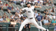 Jul 28, 2024; Chicago, Illinois, USA; Chicago White Sox starting pitcher Garrett Crochet (45) delivers a pitch against the Seattle Mariners during the first inning at Guaranteed Rate Field. Mandatory Credit: Kamil Krzaczynski-USA TODAY Sports