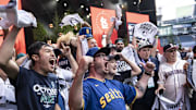 Seattle Mariners fans gather and cheer before the team's pick during the first round of the MLB Draft at Lumen Field in 2023.