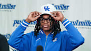 Jasper Johnson, a Lexington native and one of the top basketball players in the 2025 high school class, announces his commitment to the University of Kentucky during a ceremony at the Woodford County High School in Versailles, Ky. on Sep. 5, 2024.