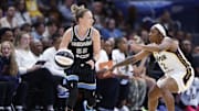 Jun 7, 2025; Chicago, Illinois, USA; Indiana Fever guard AariMcDonald (2) defends against Chicago Sky guard Courtney Vandersloot (22) during the first half of a WNBA game at United Center. Mandatory Credit: Kamil Krzaczynski-Imagn Images
