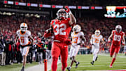 Ohio State Buckeyes running back TreVeyon Henderson (32) runs for a touchdown during the first half of the College Football Playoff first round game against the Tennessee Volunteers at Ohio Stadium in Columbus on Dec. 21, 2024.