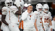 Texas Longhorns head coach Steve Sarkisian leads warm ups prior to the Cotton Bowl Classic College Football Playoff.
