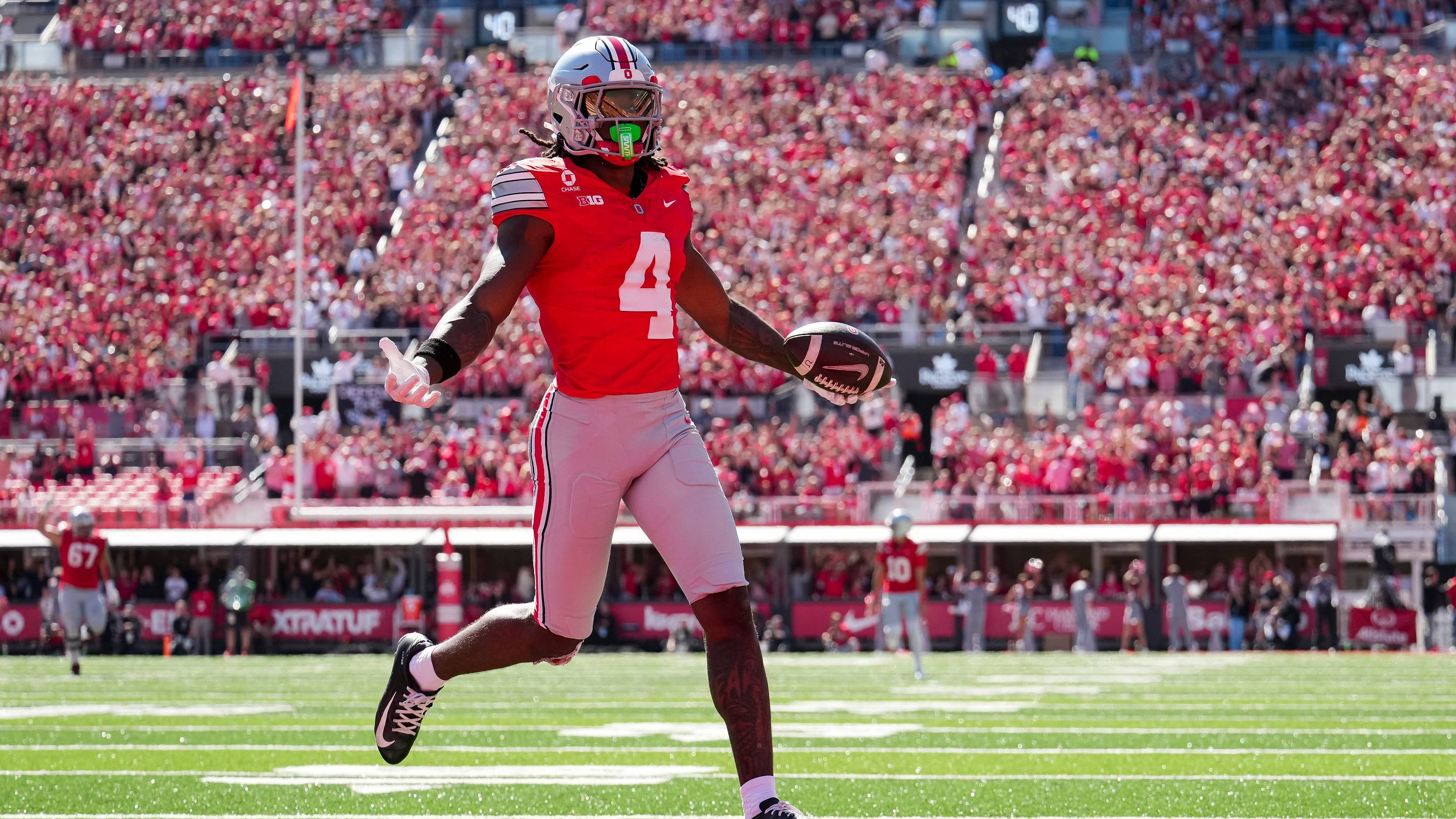 Grading college football’s biggest NIL splurges halfway through the season