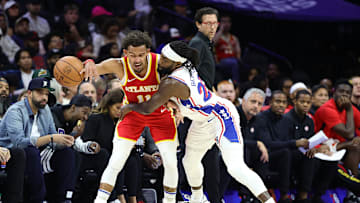 Patrick Beverley using his signature "hands-on" defense on Trae Young