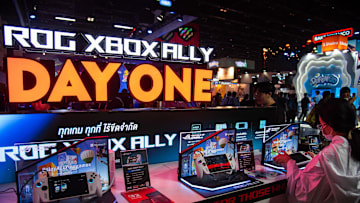 A visitor seen inspect a ROG Xbox Ally during the Thailand...