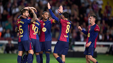 FC Barcelona players celebrate against Sevilla 