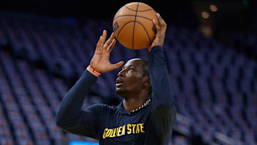 Golden State Warriors' forward Jonathan Kuminga warming up ahead of a game earlier this season.