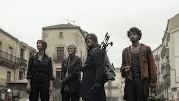 Candela Saitta as Justina, Melissa McBride as Carol Peletier, Norman Reedus as Daryl Dixon, Hugo Arbués as Roberto - The Walking Dead: Daryl Dixon _ Season 3 - Photo Credit: Manuel Fernandez-Valdes/AMC