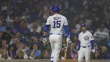 Chicago Cubs catcher Carson Kelly reacts after striking out in 2025.
