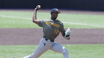 West Virginia's Carlson Reed (17) delivered a pitch against UK during their elimination game in the NCAA Regional in Lexington Ky. on June 4, 2023.