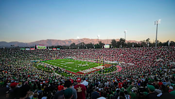 The sun sets behind the Rose Bowl stadium during the second half of the College Football Playoff quarterfinal between the Ohio State Buckeyes and the Oregon Ducks in Pasadena, Calif. on Jan. 1, 2025. Ohio State won 41-21.