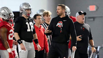 Mar 5, 2024; Columbus, OH, USA; Ohio State Buckeyes offensive coordinator Brian Hartline talks to