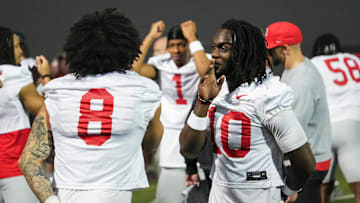 Mar 7, 2024; Columbus, OH, USA; Ohio State Buckeyes cornerback Denzel Burke (10) does a handshake