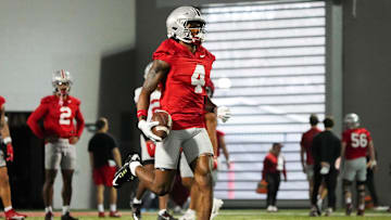 Mar 7, 2024; Columbus, OH, USA; Ohio State Buckeyes wide receiver Jeremiah Smith (4) returns a punt