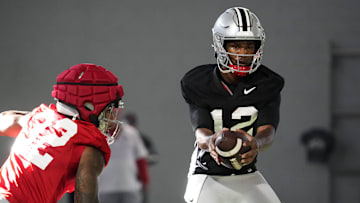 Mar 5, 2024; Columbus, OH, USA; Ohio State Buckeyes quarterback Air Noland (12) takes a snap during the first spring practice at the Woody Hayes Athletic Center.