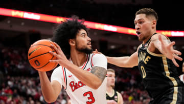 Feb 18, 2024; Columbus, Ohio, USA; Ohio State Buckeyes guard Taison Chatman (3) looks to pass around Purdue Boilermakers forward Mason Gillis (0) during the first half of the NCAA men   s basketball game at Value City Arena. Ohio State won 73-69.