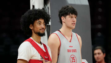 Oct 19, 2023; Columbus, Ohio, USA; Ohio State Buckeyes guard Taison Chatman (3) and center Austin Parks (25) watch from under the basket during an open practice at Value City Arena.