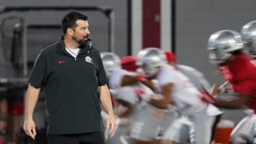 Mar 7, 2024; Columbus, OH, USA; Ohio State Buckeyes head coach Ryan Day watches players run during spring football practice at the Woody Hayes Athletic Center.