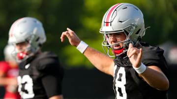 Aug 8, 2024; Columbus, Ohio, USA; Ohio State Buckeyes quarterback Will Howard (18) calls out a play during football practice at the Woody Hayes Athletic Complex.