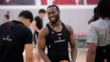 Jul 9, 2024; Columbus, OH, USA; Ohio State Buckeyes guard Bruce Thornton talks to John Mobley Jr. and Meechie Johnson Jr. during a summer workout in the practice gym at the Schottenstein Center.