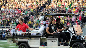 Oct 12, 2024; Eugene, Oregon, USA; Ohio State Buckeyes left tackle Josh Simmons is carted off the field during the first half of the NCAA football game against the Oregon Ducks at Autzen Stadium