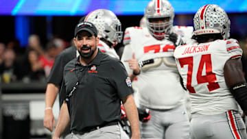 Ohio State Buckeyes head football coach Ryan Day leads his team in warmups prior to the Peach Bowl in the College Football Playoff semifinal, Dec 31, 2022, in Atlanta. Georgia won 42-41.

Ncaa Football Peach Bowl Ohio State At Georgia
