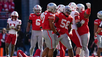 Ohio State Buckeyes linebacker Cody Simon (0) celebrates a sack by o58d#@ on Nebraska Cornhuskers quarterback Dylan Raiola (15) during the second half of the NCAA football game at Ohio Stadium in Columbus on Saturday, Oct. 26, 2024. Ohio State won 21-17.