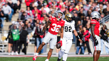 Ohio State Buckeyes running back TreVeyon Henderson (32) celebrates in the first half at Ohio Stadium on Saturday, Nov. 9, 2024 in Columbus, Ohio.