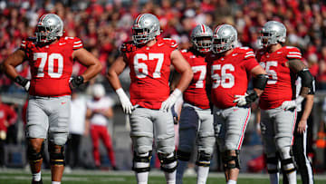The Ohio State Buckeyes offensive line waits for the play call during the first half of the NCAA football game against the Nebraska Cornhuskers at Ohio Stadium in Columbus on Saturday, Oct. 26, 2024.