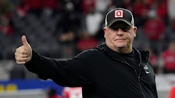 Ohio State Buckeyes offensive coordinator Chip Kelly leads warm ups prior to the Cotton Bowl Classic College Football Playoff semifinal game against the Texas Longhorns at AT&T Stadium in Arlington, Texas on Jan. 10, 2025.