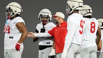 Ohio State Buckeyes linebackers coach James Laurinaitis talk to Sonny Styles during spring football practice at the Woody Hayes Athletic Center in Columbus on March 19, 2025.